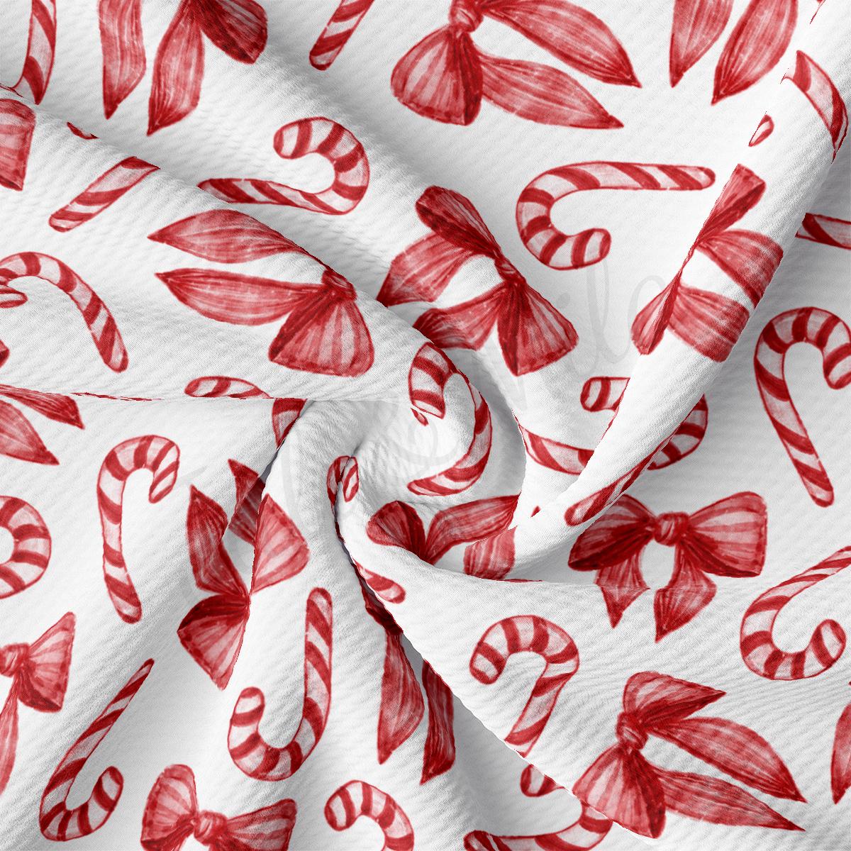 a close up of a red and white fabric