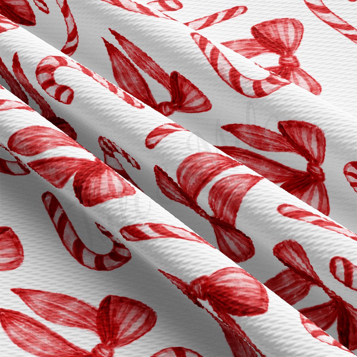 a close up of a red and white curtain