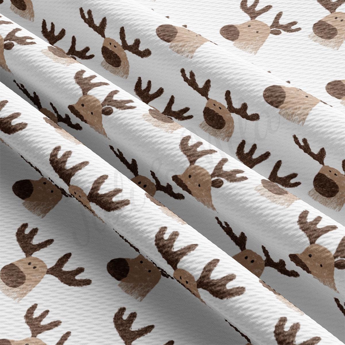 a close up of a curtain with a pattern of deer on it