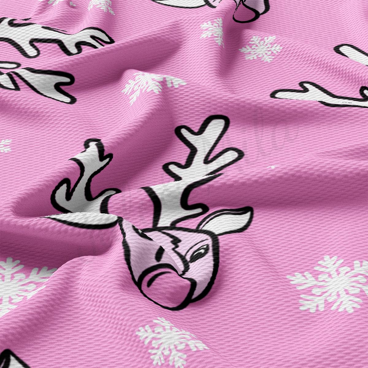 a close up of a pink fabric with white snowflakes on it