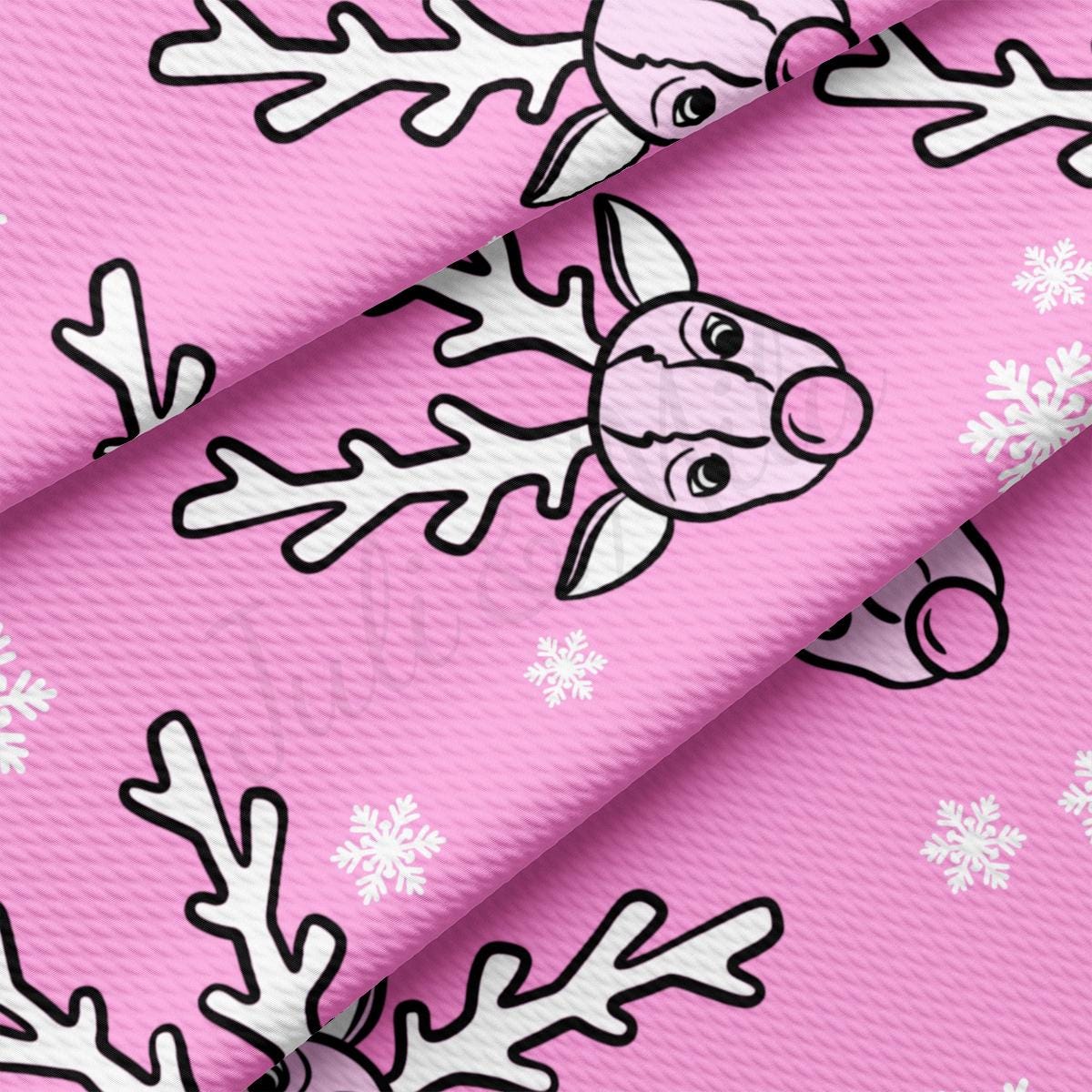 a pink background with white snowflakes and reindeers