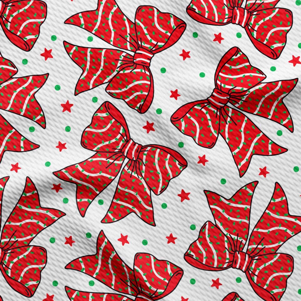 a pattern of red bows on a white background