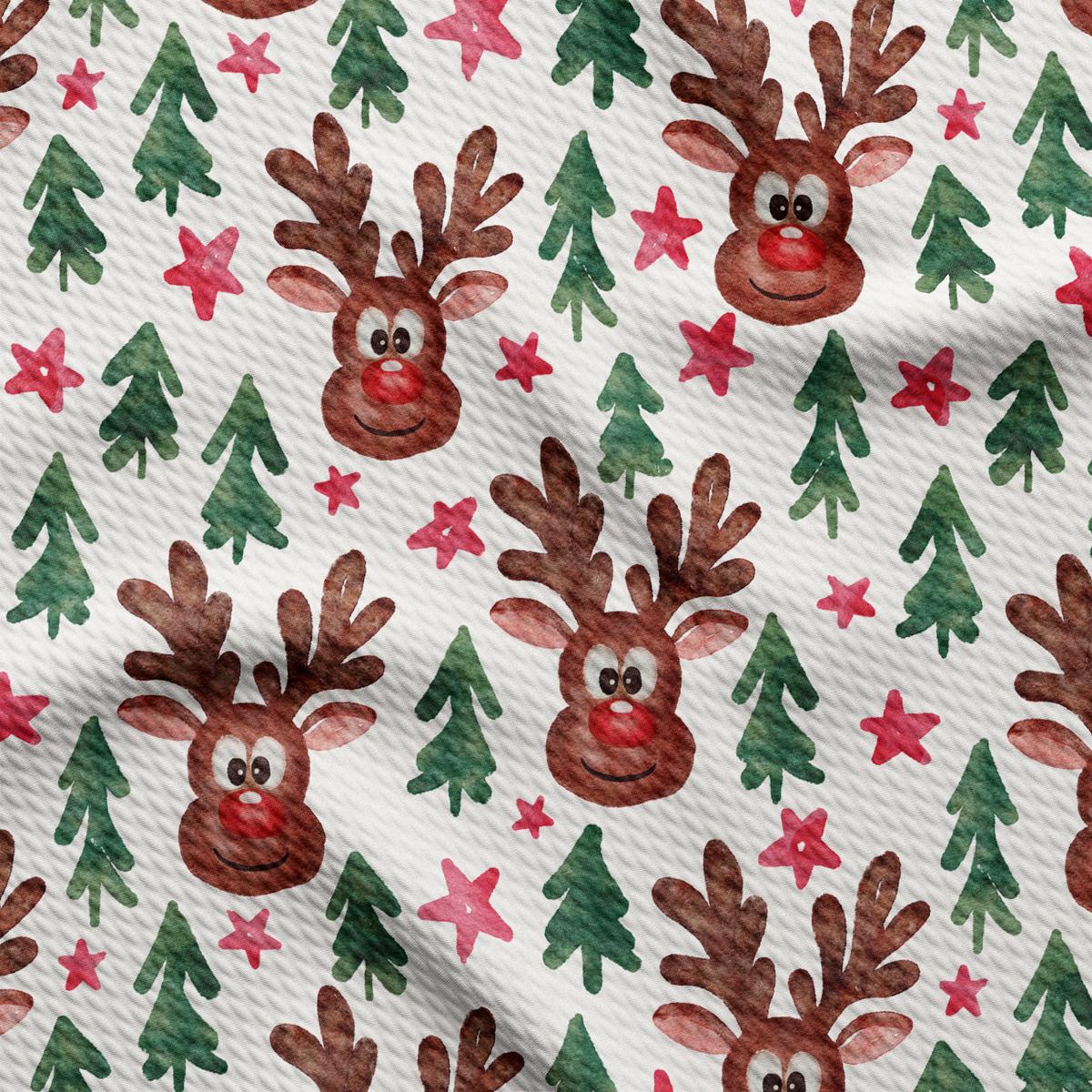 a watercolor pattern of reindeers and christmas trees