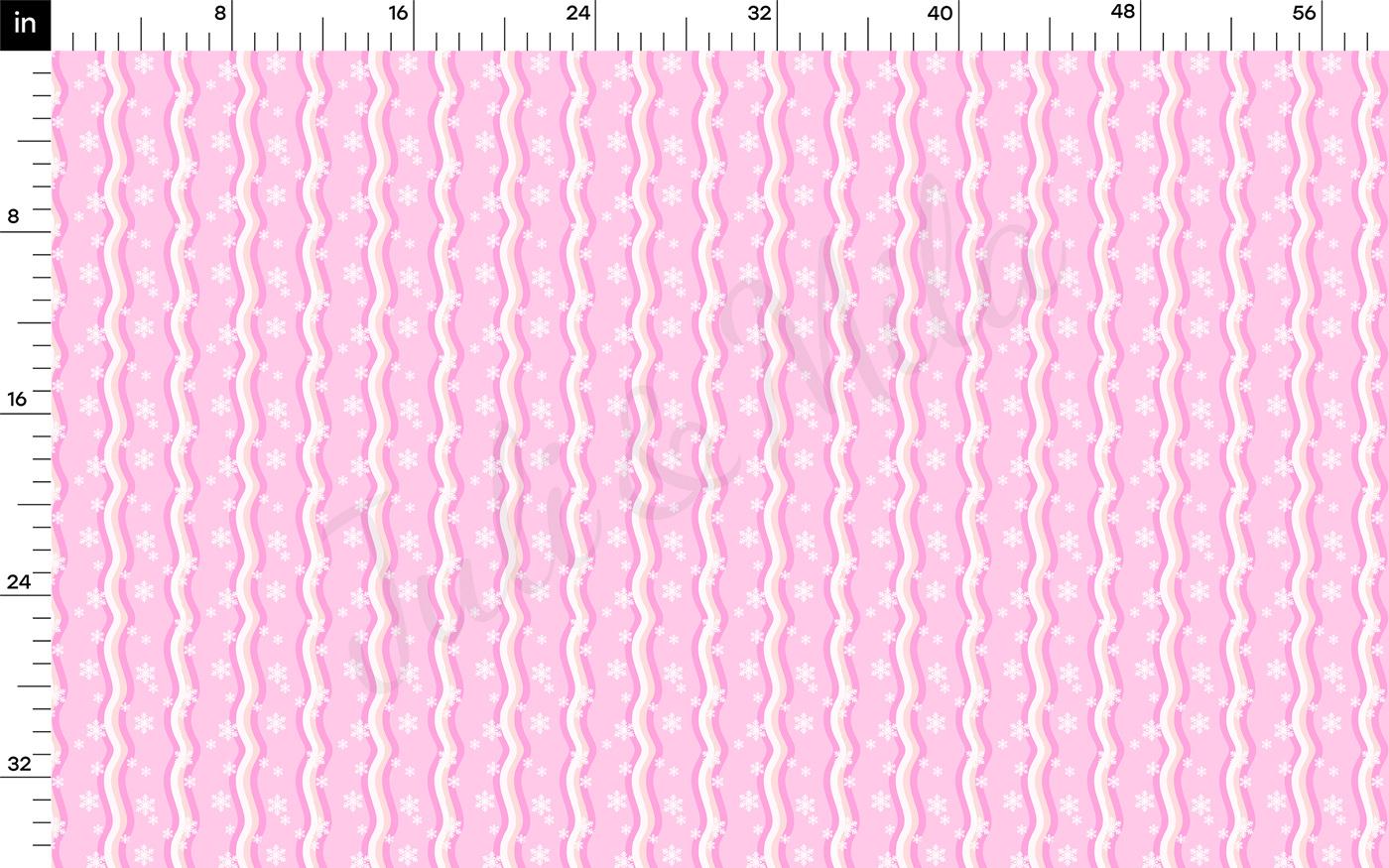 a ruler with a pink pattern on it