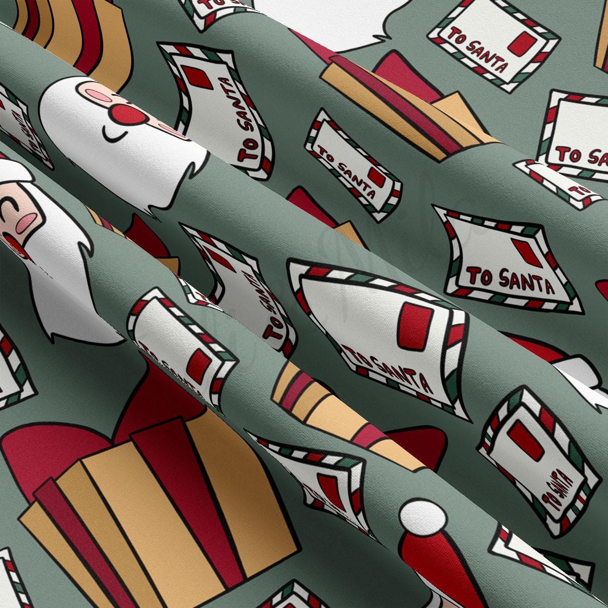 a close up of a wrapping paper with santa claus on it